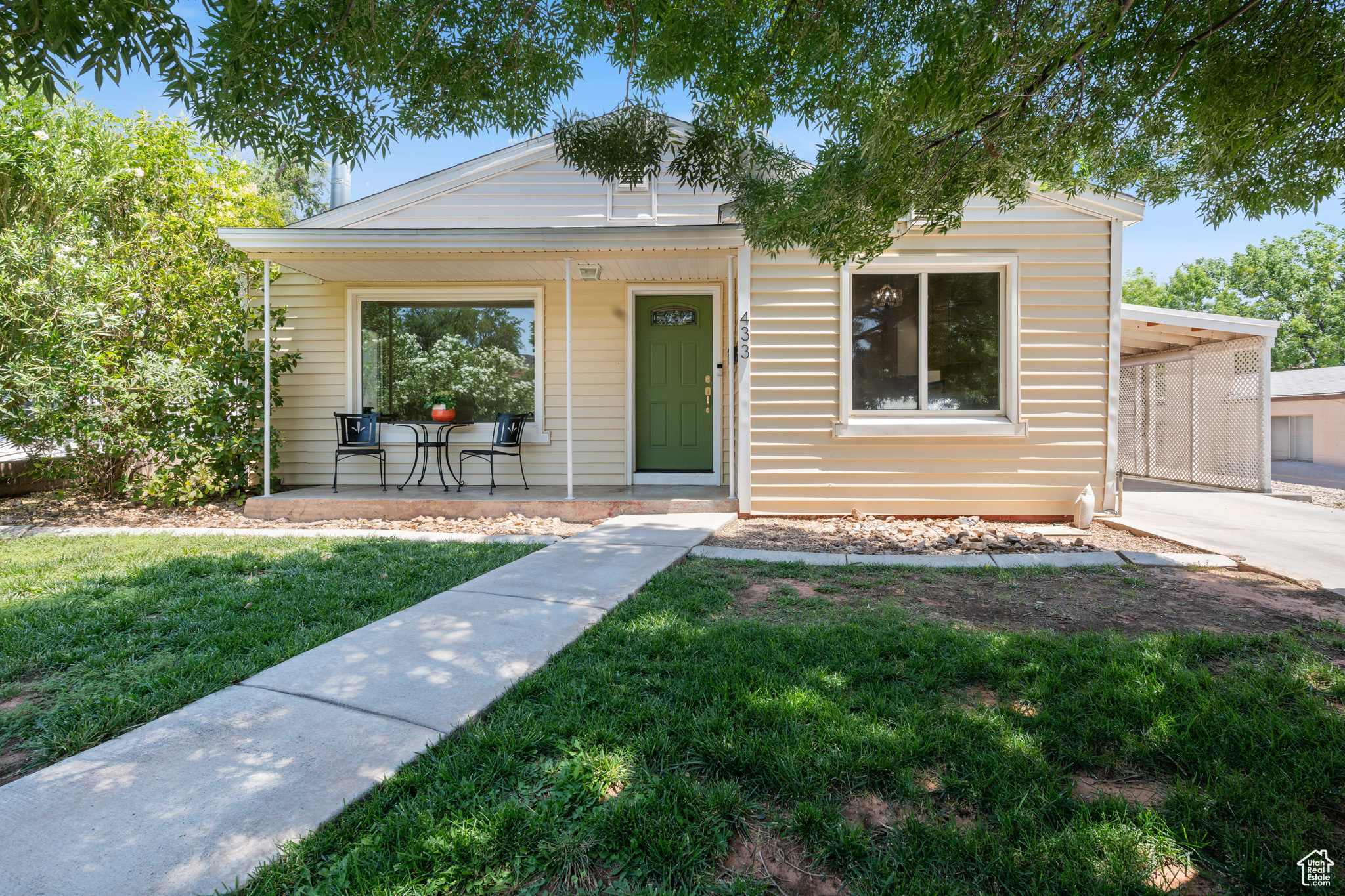 This little downtown St. George cottage has serious charm. Two beds, one bath, and shaded by mature trees with a chill, covered front patio, perfect for slow mornings. Inside? Original kitchen cabinets (yes, the cute kind), built-ins, ceiling fans, and a cozy wood-burning stove. The backyard's big and wide open: shed, pergola, and plenty of room to do your thing. You're within walking distance to schools, restaurants, the library, shops, St. George Town Square, and even the City pool! It's vintage, it's cozy, and it's right where you want to be.