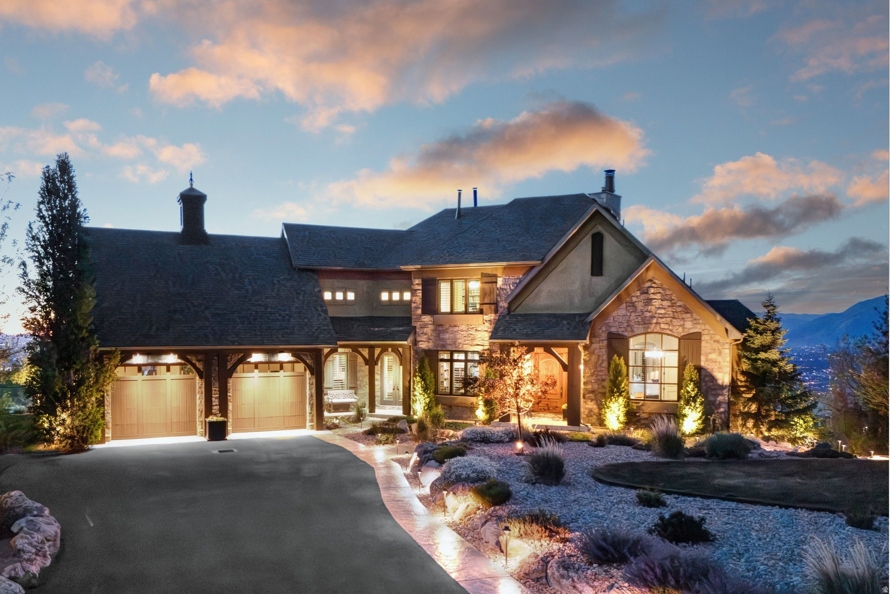 Perched on a quiet cul-de-sac in Draper's highly sought-after SunCrest community, this exceptional custom home offers arguably the best view in SunCrest, with breathtaking panoramic vistas, luxurious upgrades, and an unmatched mountain lifestyle. Featuring 5 bedrooms, 4 bathrooms, and 5,016 square feet of beautifully designed living space, this residence combines timeless craftsmanship with extensive recent improvements.  With upgrades throughout, the home showcases refinished walnut hardwood flooring, soaring ceilings, expansive windows, and stunning views from every side. Enjoy unobstructed vistas stretching across both Salt Lake and Utah Counties, including Mount Timpanogos, Lone Peak, the Oquirrh Mountains, and spectacular valley lights.  The extensively updated exterior creates a private backyard retreat perfect for entertaining and recreation. Recent landscaping improvements include a new sports court for pickleball and basketball, an in-ground trampoline, storage shed, gazebo, mature landscaping, and low-maintenance xeriscaping in the front yard. The oversized patio, beautiful rock stairways, mature trees, and spacious yard easily accommodate gatherings of any size, while the upper deck provides a peaceful, shaded setting for relaxing conversations and taking in the views.  Major system upgrades provide peace of mind and efficiency, including three newer high-efficiency furnaces, new air conditioning systems, additional attic insulation, a recently re-shingled roof, resurfaced asphalt driveway, refinished garage flooring, and a new Sub-Zero counter-depth refrigerator.  Outdoor enthusiasts will love the direct access to SunCrest's extensive trail network, connecting to Draper's renowned Corner Canyon trails and extending into Lehi and Alpine for endless hiking, biking, and outdoor recreation opportunities.  SunCrest offers a truly unique four-season lifestyle with a vibrant and welcoming community, HOA-owned clubhouse, swimming pools, fitness amenities, community events, and the beloved village green. This is a rare opportunity to own a meticulously maintained and thoughtfully upgraded view home with what many would consider the finest panoramic views in SunCrest, in one of Utah's premier mountain communities.