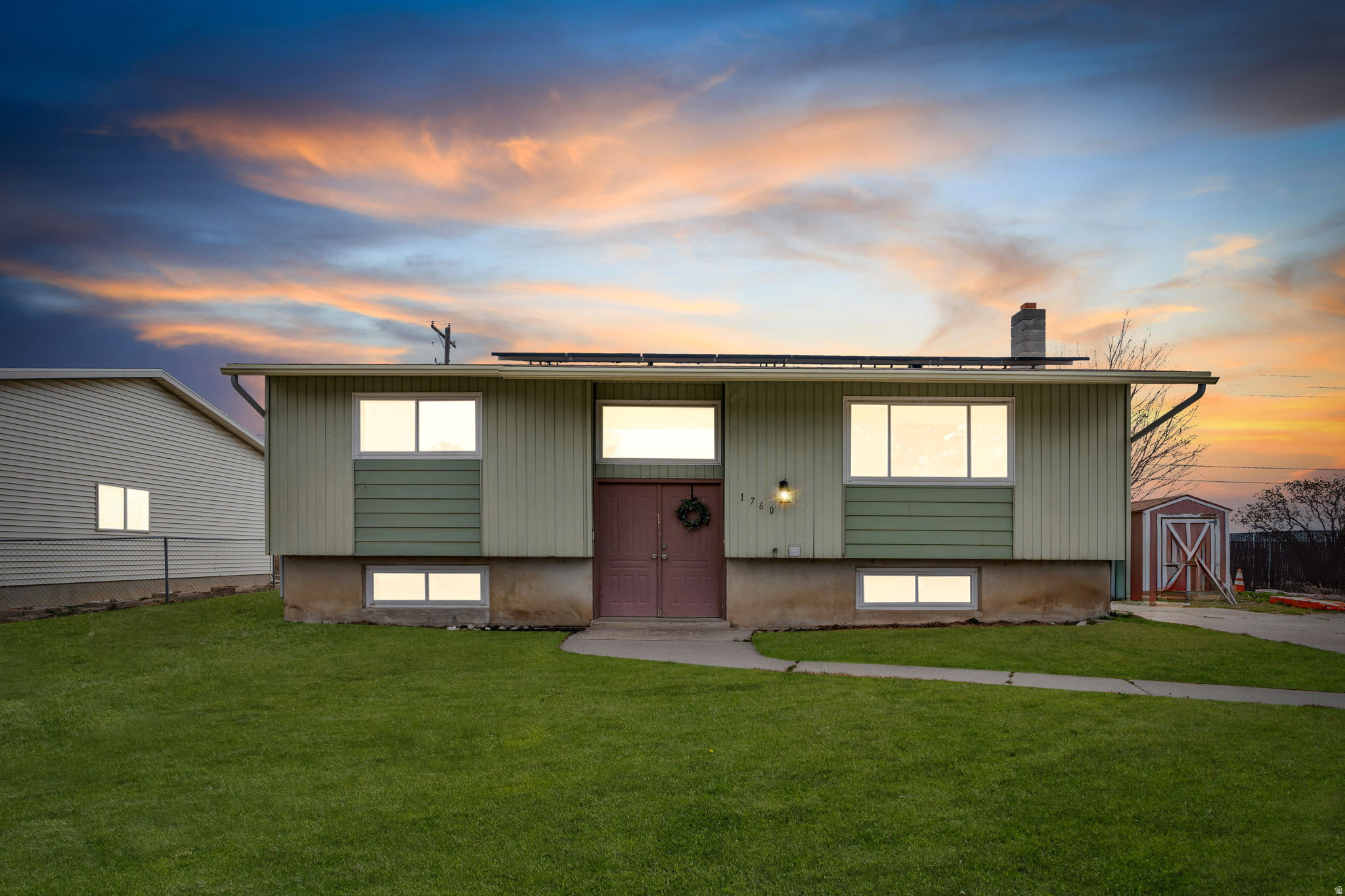 Seller Financing Available!  6 bedrooms and 3 bathrooms, offering a functional layout great for a family or a solid investment potential. Built in 1977 on a 0.184-acre lot, the property includes a fully finished basement with the possibility to use the side door as a separate entrance, making it a good fit for rental income or multi-generational living. Features include a newer asphalt shingle roof, double-pane windows, forced air heating, and central A/C. Interior finishes include carpet and linoleum throughout. The yard is fully fenced with private backyard and an amazing view. There are two large storage sheds and uncovered parking. The home also has owned solar panels to help offset utility costs. Located in the Alpine School District near Eaglecrest Elementary and Skyridge High School. Square footage figures are provided as a courtesy estimate only and were obtained from county records. Buyer is advised to obtain an independent measurement.