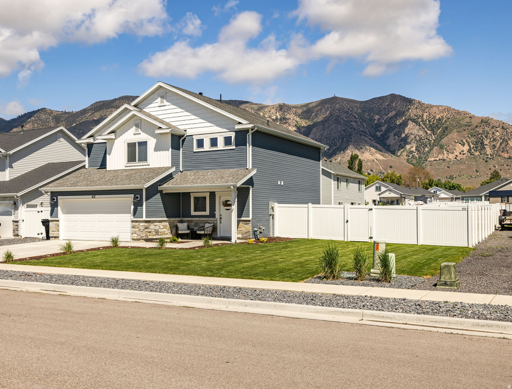 This pristine two-story property offers the rare opportunity to own a meticulously maintained, one-owner home that is truly "better than new." Completely move-in ready, this turnkey property is designed for both comfort and style, featuring sophisticated touches like granite countertops and elegant two-tone paint throughout. Step outside into your own private oasis, where the fully landscaped and fenced backyard provides the perfect backdrop for summer BBQs, outdoor entertaining, or simply unwinding while soaking in the sweeping mountain views. Conveniently located just minutes from local shopping and dining with quick access to I-15 for a seamless commute Properties like this rarely stay on the market long. Don't miss your opportunity; schedule your private showing today and step into your future home! * Square footage figures are provided as a courtesy estimate only and were obtained from builder when purchased, buyer is encouraged to verify square footage to their own satisfaction.