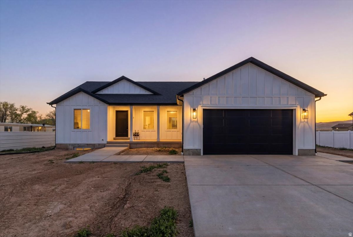 Built in 2025, this like-new home offers 2,900 sq ft with 3 bedrooms and 2 full bathrooms. The main level features an open floor plan with beautiful cabinetry, quartz countertops, and a fully equipped kitchen with all appliances included. The unfinished basement provides room for future expansion and customization to fit your needs. Situated on a .50-acre lot, the property includes a vinyl fence and offers scenic mountain views. Move-in ready with modern finishes and the benefits of new construction without the wait.