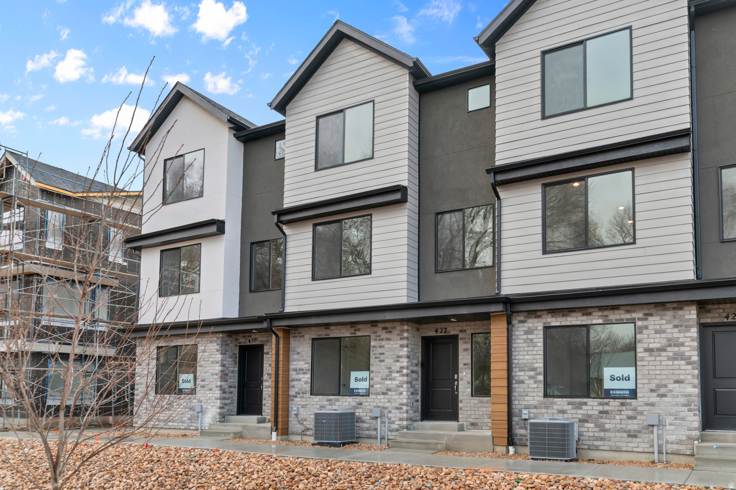 Set to complete first week of September. Welcome to the Haven at Midtown Village in Ogden-an efficient 3-story townhome offering 4 bedrooms, 3 bathrooms, and a 2-car garage. The entry level includes a private bedroom and full bath-ideal for guests or a home office. The open-concept main floor features a modern kitchen with a large island and stainless-steel appliances, flowing into the dining and family areas. Upstairs offers additional bedrooms, laundry, and a spacious primary suite with walk-in closet and private bath. Enjoy low-maintenance living with HOA-maintained landscaping-schedule your showing today! ***ASK ME ABOUT THE BELOW MARKET INCENTIVE RATES with our preferred lender + $$$ towards Closing costs! *** No representation or warranties are made regarding school districts or assignments. Photos may be of a similar home. Buyers to verify all colors, materials, options, and square footage, which is provided as an estimate from building plans. Sales Center Hours: Mon, Tue, Thu, Fri, Sat: 11 AM  6 PM Wed: 1 PM  6 PM | Closed Sun Call to schedule your visit!