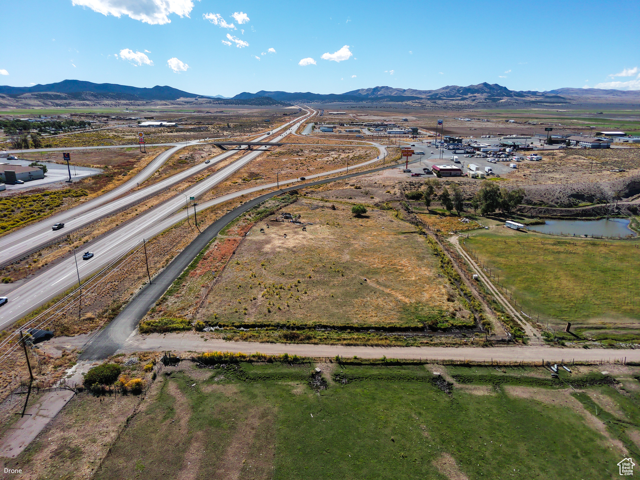 Unlock the potential of this exceptional property, available at an unbeatable price of just $5 per square foot! With prominent freeway frontage and easy access from the frontage road, your new business will benefit from maximum exposure to bustling traffic. This versatile space comes with animal rights, making it ideal for a variety of business ventures. Don't miss out on this incredible opportunity to establish your business in a growing area with limitless possibilities.