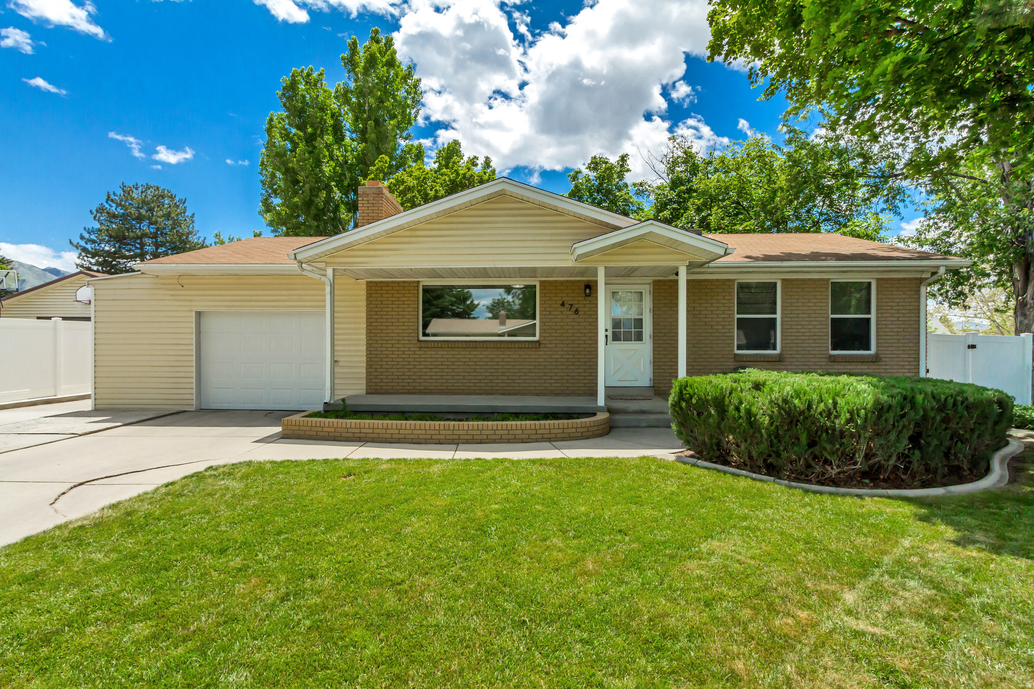 Single level living with a large open kitchen and dining area. The large laundry room downstairs has the potential of another bathroom along with a laundry chute. Cozy up to the two replaces. Garage has a Workshop/Storage area. There is also a large RV Parking area. Bring your hammock to enjoy this relaxing backyard. Refrigerator, newer washer, dryer and greenhouse are included. A must see!