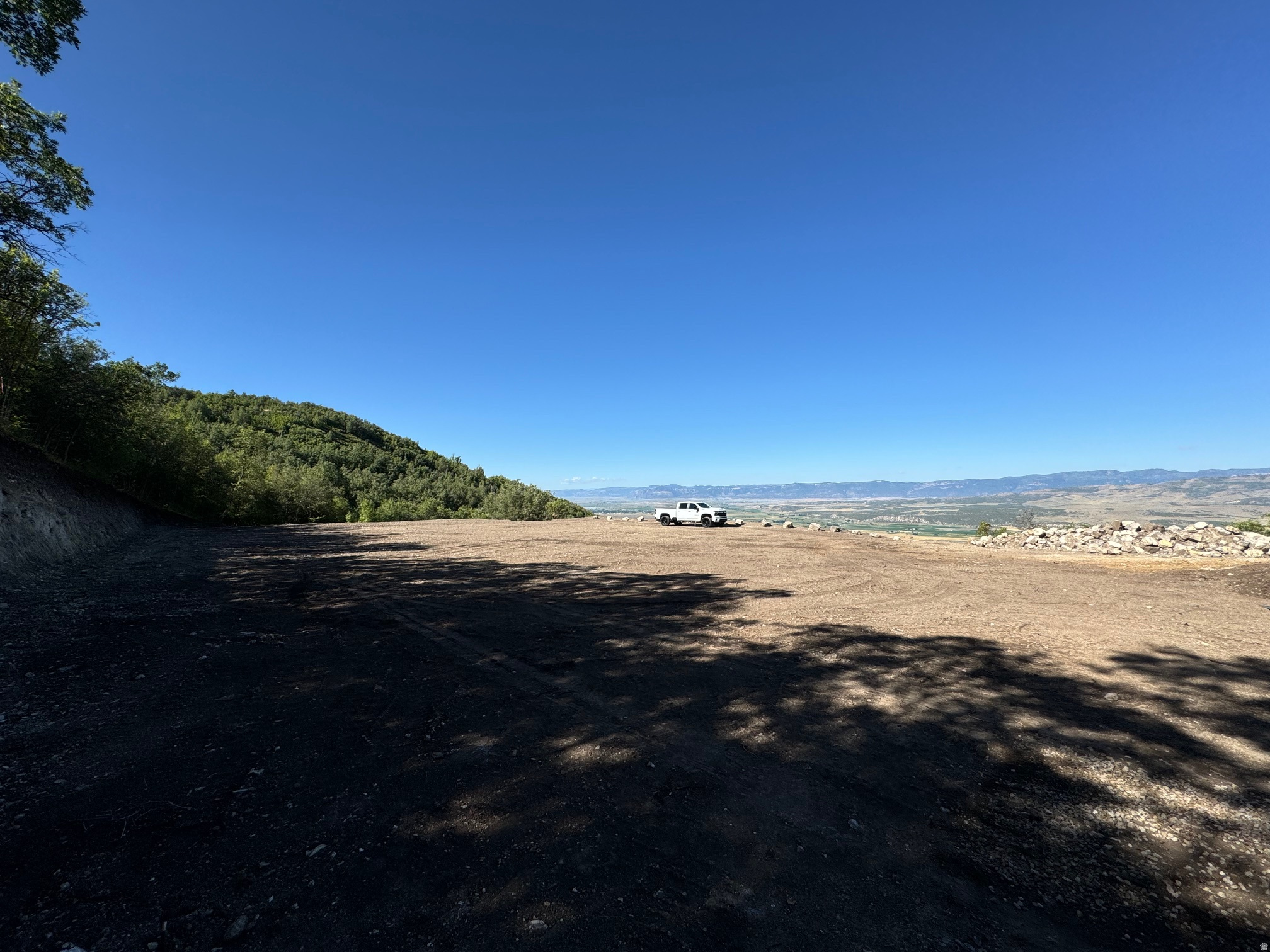 Imagine waking up to sweeping panoramic views of the mountains and valley below - every single morning, from the cabin you've always dreamed of building. This rare 2.5-acre lot in The Hollows community at Skyline Mountain Resort in Fairview, Utah is not just a piece of land. It's your launchpad to the mountain lifestyle.Just 90 minutes from Salt Lake City, this is the kind of escape that most people dream about and few actually find. Located along the legendary Skyline Drive, you'll have direct access to world-class ATV trails and snowmobiling routes right out your front door. When the seasons change, so does the adventure - world-renowned fishing and hunting, plus a short drive to the Palisade Golf Course, make every season worth staying for.As part of The Hollows community, HOA membership includes access to Skyline Mountain Resort, where there truly is something for everyone - pickleball, golf, and a swimming pool are all just minutes away, making this the perfect destination whether you're looking for adventure or a place to simply unwind with family.The hard work is already done. This lot has been excavated, graded, and thoughtfully prepared so you can focus on building, not clearing. Power and water are at the road and ready for hook-up, the driveway is in with compacted road base, a 12" culvert is installed, and a new 20' Conex container - mostly buried and fully structurally supported - is already on site and ready to serve as built-in storage or the start of something creative. In a cabin community where lots like this rarely come available, Lot 12 stands out. The prep work alone represents significant investment, and the views are simply irreplaceable. Information to be verified by buyer. Driving Directions: 39.60499, -111.38738 https://skylinemountainresort.com/