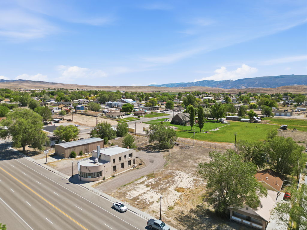 NEW SURVEY! Prime Gunnison City Main Street Commercial Property with additional ground available ( Parcel # 2543 ) listed separate for sale at $32,500 Very rare COMMERCIAL opportunity to purchase a cleared building lot ready for your new build! OPPORTUNITY will not LAST LONG!  PAID WATER HOOKUP, POWER ON PROPERTY, PRESSURIZED IRRIGATION, SEWER HOOKUP IS 2K.  20' Easement on south side of parcel running west to east for entrance to Parcel # 2543 Square footage figures are provided as a courtesy estimate only and were obtained from Sanpete County .  Buyer is advised to obtain an independent measurement. *ADDRESS IS APPROXIMATE