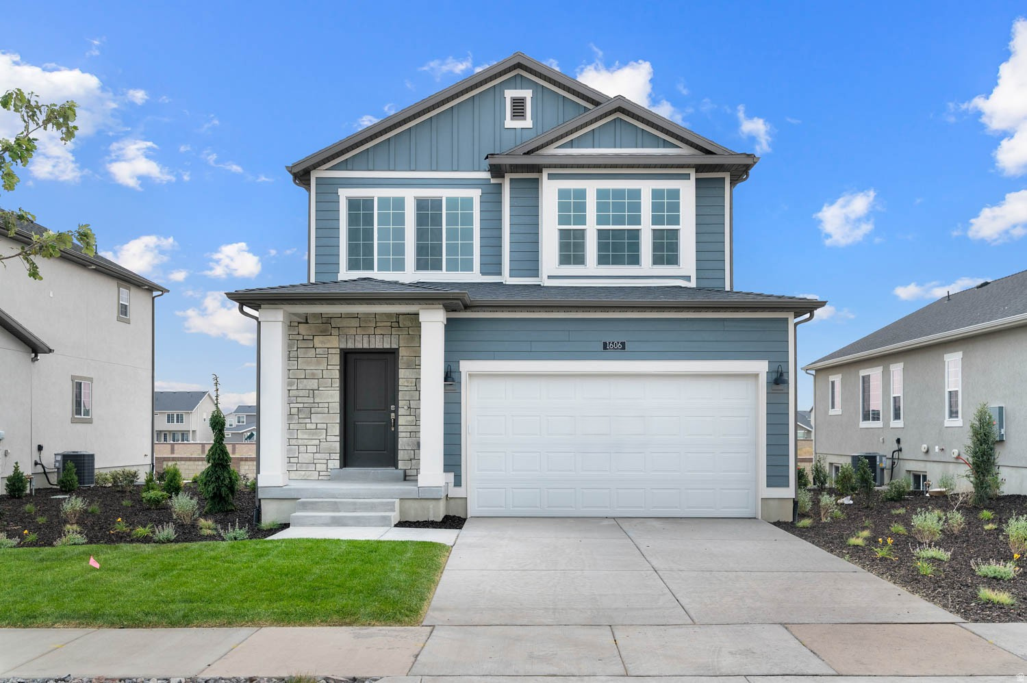 Welcome to this beautifully designed Carson home featuring a premium interior package with modern finishes throughout. The kitchen is a standout with stylish gray laminate cabinetry, sleek quartz countertops, and a full suite of stainless steel gas appliances-perfect for both everyday cooking and entertaining. Enjoy a combination of laminate hardwood, vinyl tile, and carpet flooring that offers both durability and comfort in all the right spaces. Thoughtful touches like can lighting and Craftsman-style baseboards and casing, elevate the home's overall aesthetic. The owner's bathroom provides a relaxing retreat with cultured marble shower surrounds and satin and brushed nickel hardware, while energy-efficient features and a tankless water heater ensure comfort, convenience, and long-term savings. Comes fully landscaped for an easy move in experience. This home blends functionality and style in every detail!