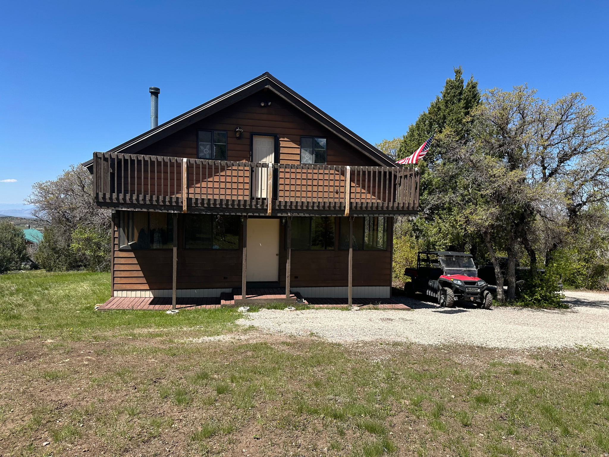 Cozy Turnkey Pine Creek Ranch Cabin  Adventure-Ready: Includes a 2018 Side-by-Side with super low miles and a 14-foot trailer, plus two well-maintained Yamaha snowmobiles with a reliable tilt trailer-perfect for exploring the mountains. Move-In Ready: Fully furnished with all the amenities of home, ready for immediate enjoyment.  Fully Equipped Mountain Retreat Escape to your own slice of mountain paradise in the Pine Creek Ranch Cabin Subdivision! This stunning, fully furnished, turnkey cabin offers all the comforts of home with breathtaking features. Tucked into the gorgeous foothills of the Manti-La Sal National Forest, this spacious and comfortable Pine Creek Ranch cabin is your private gateway to Utah's legendary outdoor playground. With vaulted ceilings, open-concept living, and room to gather, this isn't just a cabin-it's a family-sized mountain home designed for memory-making. Step inside to true mountain comfort: Spacious & Comfortable: Soaring 20-foot vaulted ceilings create an open, airy feel and makes this 2000 sq ft home feel more like 3500. Huge open loft  the ultimate flex space: large enough for the most epic bunk room, create a game room with foosball, poker table & TV, play winter cornhole from end to end or use as a quiet office or sitting area. Massive mudroom  built for real mountain life: room for all your gear-boots, packs, tools or fishing rods or space for a freezer or extra fridge. Two Spacious great rooms with wood-burning stove, two oversized sectional sofas-perfect for movie nights or hosting the whole crew. Full kitchen with peninsula seating for 4 or 5, cook Thanksgiving dinner without bumping elbows. Cozy Warmth: Enjoy a top-of-the-line wood-burning stove and efficient propane furnace, powered by a 500-gallon owned propane tank (not rented) and Rocky Mountain Power. Serene Location: Nestled in the peaceful Pine Creek Ranch, offering solitude and stunning mountain and valley views. Pine Creek Ranch perks included: Private trout stream just down the hill Year-round access via snowmobile on well-maintained roads 70-acre common space perfect for snowmobiling, sledding, fishing or large outdoor family gatherings Gated community Priced to sell fast  Bring your family, your toys, and your vision-this spacious retreat is ready for its next chapter.  Square footage figures are provided as a courtesy estimate only and were obtained from county records. Buyers are advised to obtain an independent measurement.