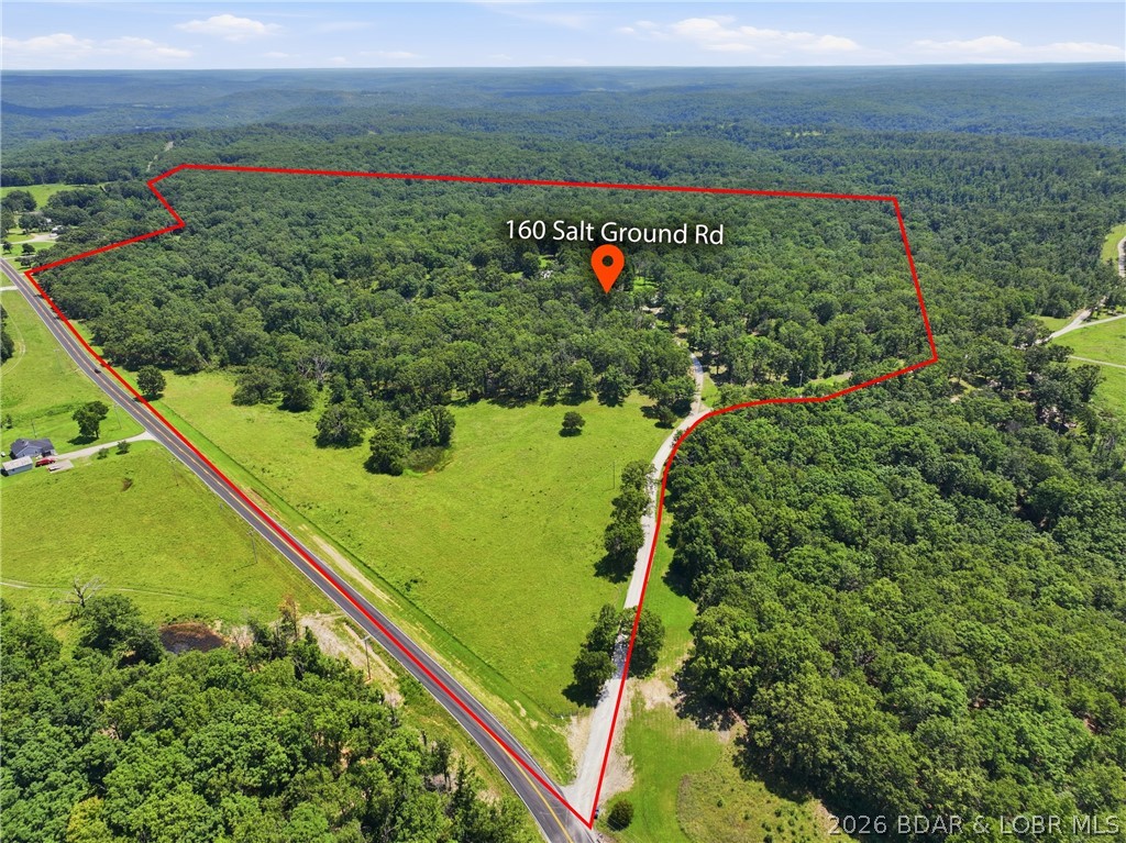 Discover the possibilities with this exceptional 54 acre property. Featuring a 3 bedroom with covered front porch and outbuildings, this property offers the perfect opportunity for a private residence, hobby farm, or full-scale agricultural operation. With approximately 54 acres of usable land, there is ample room for livestock, hay production, crops, or future expansion. Enjoy the peace and privacy of country living while investing in land with outstanding farming potential. Great location just a few miles off highway 54 you get all the privacy and space while still close to town and school.  Whether you're looking to build your agricultural dream or simply enjoy wide-open spaces, or have your own homestead, this versatile property is ready for your vision.