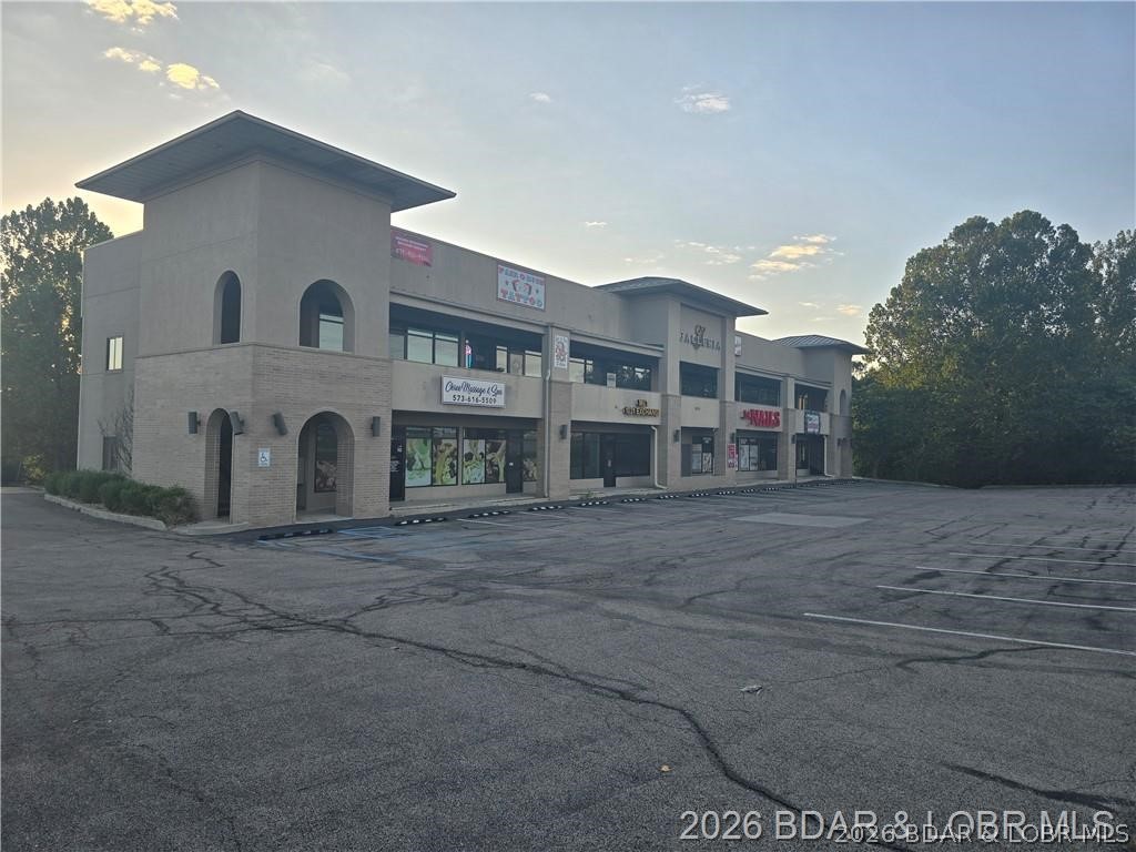 Professional office/retail building on Osage Beach Parkway with excellent visibility and strong traffic counts. The Galleria has been a strong asset with a diverse tenant base that brings strong customer bases. Some tenants have been in place for many years with no intentions of leaving. Currently has 2 smaller units that are vacant and could be used for an owner occupy office. (1 of the 2 will likely be leased soon). Expansion to the area will continue profitability for a very long time.