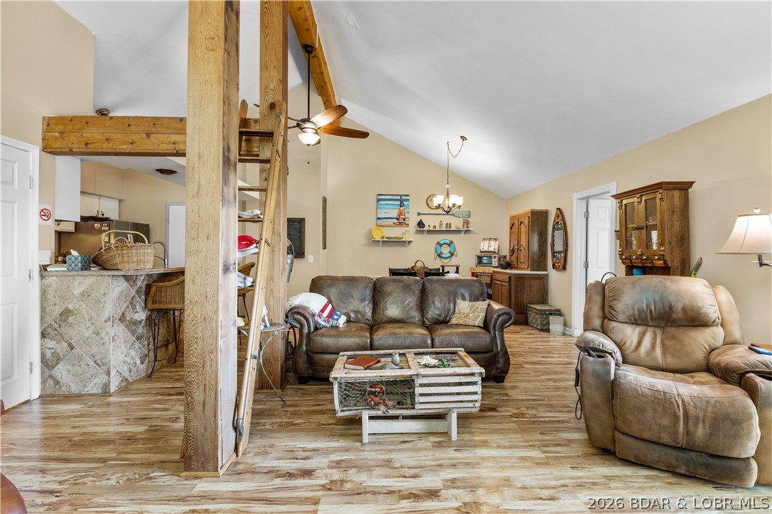 Welcome to the heart of one of Lake of the Ozarks' most sought-after resort communities - Tan Tar A Estates, neighboring Margaritaville.  Not many are offered at this price tag.  A little TLC will go a long way here.  This spacious home offers  3 bedrooms plus a bonus room that could be a bedroom, game room, crafting room, gym whatever you need it to be. Open floor plan. Amenities are available for all ages – several swimming pools, kids slide and splash pads, swim up bar, live music, billiard room, arcade, indoor water park, LandShark Bar & Grill with lake side dining and the list goes on. A true golf cart community with FREE golf. Call me for details. Centrally located by land and water. Whether you're searching for a full-time residence, weekend getaway, or investment property, this home delivers the perfect combination of lake lifestyle and income-producing potential. Comparable short-term rentals in the area benefit from strong vacation demand driven by resort amenities and year-round attractions, making this an exceptional opportunity for investors and lake lovers alike.