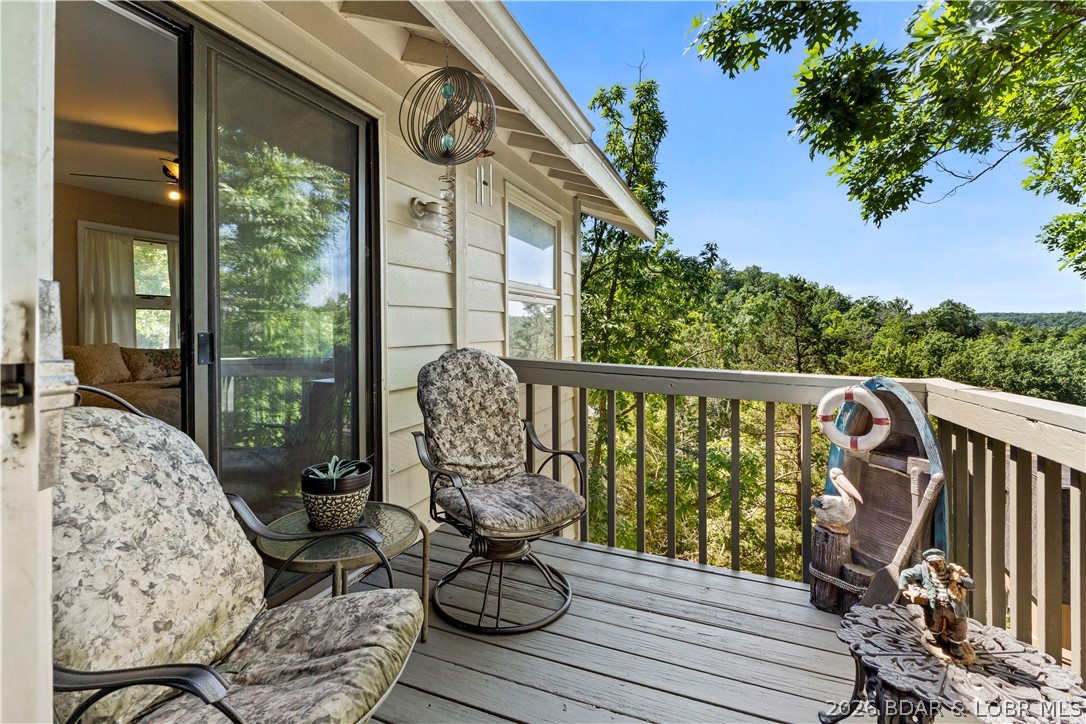 Welcome to the heart of one of Lake of the Ozarks' most sought-after resort communities - Tan Tar A Estates, neighboring Margaritaville.  Not many are offered at this price tag.  A little TLC will go a long way here.  This spacious home offers  3 bedrooms plus a bonus room that could be a bedroom, game room, crafting room, gym whatever you need it to be. Open floor plan. Amenities are available for all ages – several swimming pools, kids slide and splash pads, swim up bar, live music, billiard room, arcade, indoor water park, LandShark Bar & Grill with lake side dining and the list goes on. A true golf cart community with FREE golf. Call me for details. Centrally located by land and water. Whether you're searching for a full-time residence, weekend getaway, or investment property, this home delivers the perfect combination of lake lifestyle and income-producing potential. Comparable short-term rentals in the area benefit from strong vacation demand driven by resort amenities and year-round attractions, making this an exceptional opportunity for investors and lake lovers alike.