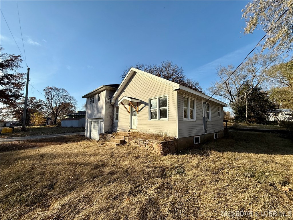 Bring your vision and finish this affordable 3-bedroom, 2-bath home your way! Progress has already been made including a new roof and updated breaker boxes to 220 amp. The layout offers a comfortable flow with three bedrooms, and could be 2 full bath, hardwood floors on main floor and a garage for extra storage or workspace. Perfect for investors, DIY enthusiasts, or first-time buyers looking to build equity. With some finishing touches, this property could shine again as a cozy home or rental.