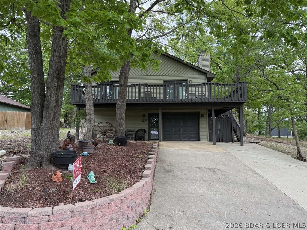 Updated 4+ bdrm, 3 full bath lake home in very nice community at the 46MM of Lake of the Ozarks. Open concept kitchen/LR, vaulted ceiling, island, granite countertops, stone fireplace, hardwood floors, premium carpet/pad, travertine tile. All updated within 5 years, including new roof, hvac & mechanicals. Fawn Valley community includes community well,sewers, trash, pool, dock slip included.