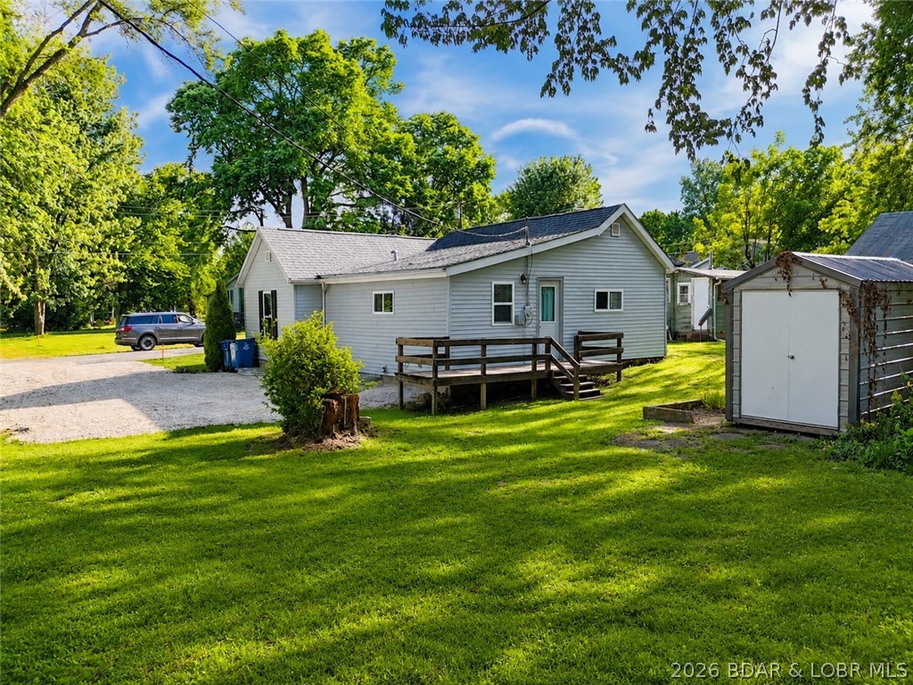 Renovated 3-bedroom, 1-bath home on a double lot in Eldon, Missouri, within walking distance to school, minutes from downtown Eldon, local parks and shopping, with an easy commute to Jefferson City and the Lake of the Ozarks area. Seller is offering $7,000 toward closing costs or an interest rate buydown, plus a one-year home warranty for a worry-free move-in. Recent renovations include a brand new bathroom, luxury vinyl plank flooring throughout, fresh interior paint, updated lighting and ceiling fans, new gas lines, serviced HVAC system, Leaf Filter gutters, expanded gravel parking, and extensive crawlspace, drainage, waterproofing, and foundation support improvements. The kitchen offers ample cabinet space and room for everyday dining. The large double lot provides space for pets, gardening, entertaining, RV or boat parking, or future additions. Built over 100 years ago, this home blends original character with major systems and structural work already completed, a rare combination of charm and move-in-ready peace of mind. With this list of updates already done, buyers can move in and start enjoying the home from day one.
