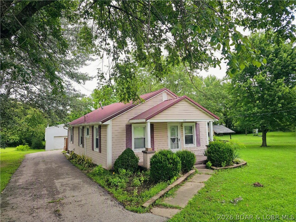 WOW! Don't miss this beautifully maintained, move-in ready home offering 2 bedrooms, 1.5 bathrooms, and approximately 1,010 square feet of comfortable one-level living. The spacious kitchen features abundant cabinetry and opens to the dining area, creating a functional layout for everyday living and entertaining. A large laundry room provides additional storage and convenience.
Situated on a gorgeous park-like 2 lots, the outdoor space is just as impressive with a covered front porch, back deck, gazebo, and a 40' x 23' shop with concrete floor and a wood stove—perfect for hobbies, storage, or a workshop. 
Located in a growing community known for excellent employment opportunities and a highly regarded school district. This property combines small-town charm with modern convenience. Schedule your private showing today!