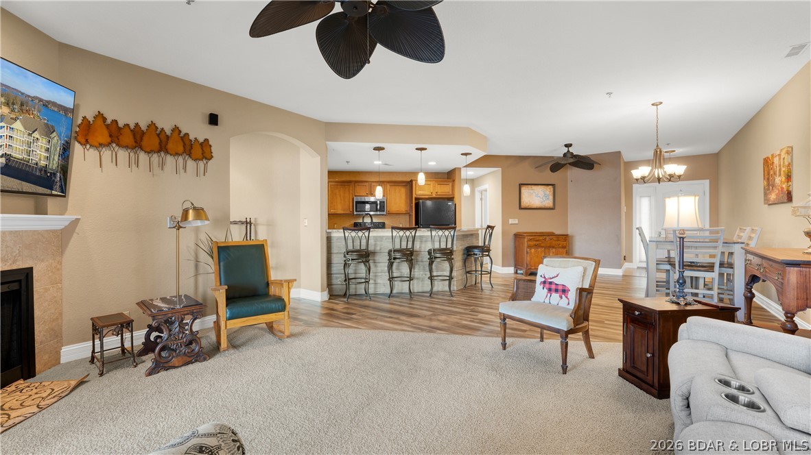 Experience lakefront living in this 3-bedroom, 2.5-bath condo with beautiful, panoramic lake views. This unit features low-maintenance LVP flooring, granite countertops, and a well-equipped kitchen that’s ideal for both everyday living and entertaining.

The spacious primary suite offers dual vanities, a walk-in shower, and a relaxing jetted tub. Step out onto the screened deck with removable vinyl windows, allowing you to easily enjoy the big lake views as a three-season room during cooler months.

This unit includes a 12x32 boat slip, with a garage and storage unit available for additional purchase. The resort-style complex also features an elevator for convenient access to the lakeside amenities.

Located close to shopping, dining, golf, and entertainment by both land and water, this is a great opportunity to enjoy everything the Lake has to offer.
