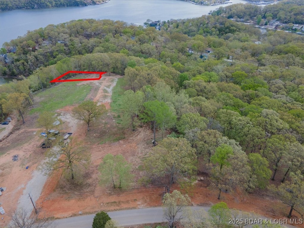 Build your dream home on this beautiful 0.33-acre lot with serene lake views and gentle terrain-perfect for easy construction. Located in Osage Heritage subdivision, this property offers a peaceful setting with modern conveniences already in place. Choose from our thoughtfully designed home plans or bring your own vision to life. A Rare opportunity to create a custom home in growing, desirable community!