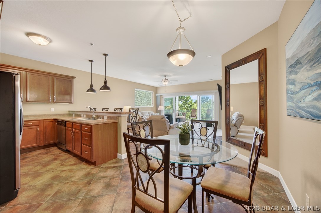 Sunset Palms stands apart from the crowd. This smaller, self-managed, non-rental community sits right on Highway 5 — no five miles drive down a lake road, just pull in and you're home. Gated, well-maintained, and built in 2006 with quality construction, the pride of ownership here is visible the moment you arrive. This 3BR/2BA end unit offers 1,447 sq ft of single-level living with a fireplace, jetted tub, ceiling fans, and all appliances included — plus washer and dryer. The 12x36 covered slip (Dock 9, Slip 4) comes with a 4,500 lb. boat lift, both included in the sale. A garage directly in front of the unit is available for an additional $40,000.One level up from parking with elevator access. HOA at $922.86/quarter covers cable, dock, road, sewer, trash, and water — among the lowest assessments lakeside for what you get. Community amenities include a pool, hot tub, pickleball, and clubhouse. Whether you're looking for a full-time home or a relaxed lake retreat, this one delivers. Pre Listing Inspection and One Year Home Warranty