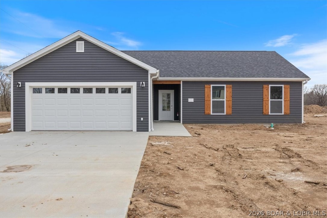 Construction is complete on this brand-new 3 bedroom, 2 bath home offering 1,540 sq ft of modern living space in Eldon, MO. Enjoy a fresh start with no previous owner surprises, no outdated finishes, and no “we can just live with it” design decisions. The open layout provides comfortable living for everyday routines, entertaining, or simply enjoying a clean slate home. The 2-car garage offers ample space for parking, storage, hobbies, and all those items you promise you will organize someday. Energy efficient construction with spray foam insulation helps keep utility costs manageable while maintaining year-round comfort. Conveniently located near schools, shopping, dining, and local employment opportunities, this home offers both comfort and accessibility. Construction is complete and the home is move-in ready, making it an excellent opportunity for buyers looking for brand-new construction without the wait.