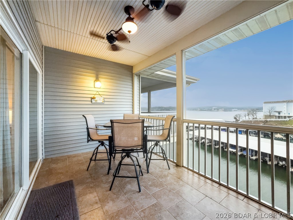 TOP floor end unit with main channel view! Comes with 12 x 32 boat slip and 10.000lb hoist at Regatta Bay.
Front-row views of the lake and boat traffic. Enjoy great crappie fishing at your dock. Super clean wellmaintained, with LVP flooring, new carpet in bedrooms, with a comfortable open layout. The primary suite
includes a large bathroom and walk-in closet, the guest bedroom and second bath provide flexibility for visitors
or full-time use. Out front the patio has a seating area and room for grilling. Large private storage closet.
Lakeside there's a screened deck with tile floor. Being a top-floor, end unit adds extra privacy and appeal. Sold
turn-key with all furnishings and fixtures included. The standout feature is the included 12x32 boat slip with a
10,000-lb hoist, located in the newer docks with easy drive-up access. Load coolers and lake toys right at the
ramp and be on the water in minutes. Whether you’re looking for a weekend getaway, full-time condo, or
investment opportunity. This unit has been on a vacation rental program. This Regatta Bay unit checks the
boxes buyers are looking for. Get ready for summer now! Seller to pay balance of the year HOA fees!