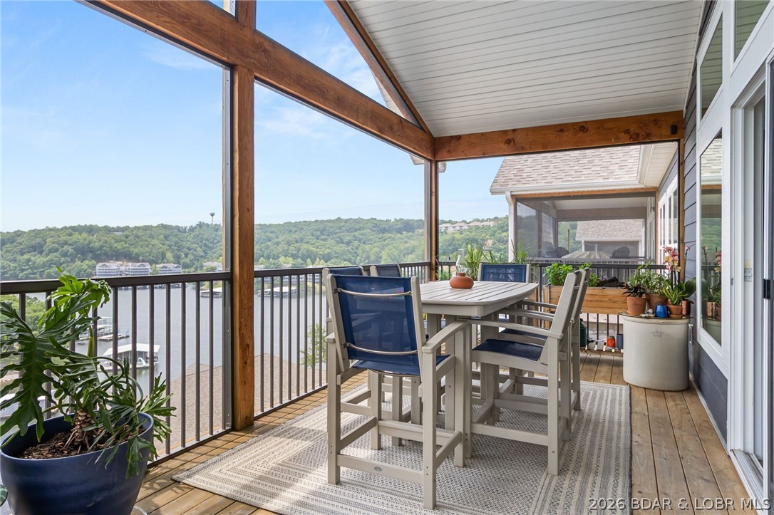 Welcome to your ultimate Lake of the Ozarks retreat! The seller is sweetening the deal with incredible perks: 1 FULL YEAR OF HOA FEES PAID BY SELLER ($4,884 VALUE!)  INCLUDED 12x36 BOAT SLIP for effortless lake access! INCLUDED GOLF CART($5,000 value)for cruising resort amenities! Picture waking up to panoramic views over the Big Niangua, where your hardest decision is whether to hit the lakeside pool, play pickleball, or cruise on the water. Stop dreaming and start living the Lake of the Ozarks Adventure! Featuring Modern design with clean lines, contemporary finishes, and an inviting, open-concept layout that maximizes space and natural light, Nestled in a highly desirable Camdenton location, this exceptional modern home offers the perfect blend of style, comfort, and the coveted lake lifestyle. Designed for effortless entertainment and low-maintenance living, this property is truly a rare find! Located in a quiet, sought-after Camdenton enclave, giving you peaceful privacy while keeping you just a short drive or boat ride from dining, shopping, and entertainment. Whether you are looking for a full-time residence or a weekend getaway 76 Barolo Lane is ready to welcome you home.