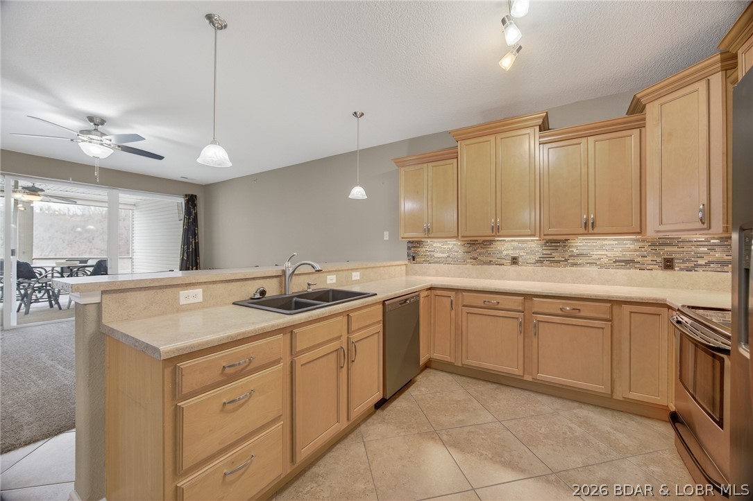 Experience carefree lake living at Sunset Palms, one of Lake of the Ozarks’ premier gated waterfront communities at the 35MM. Perfect for families or those seeking a secure, well-maintained retreat, this self-managed complex reflects exceptional pride of ownership and offers outstanding amenities including a lakeside pool, hot tub, clubhouse with full kitchen, game room, and two elevators. Ideally located just off Hwy 5, you’re minutes from Camdenton and Sunrise Beach by land, while by water you’ll enjoy quick access to many of the lake’s favorite waterfront restaurants, marinas, and entertainment destinations. This walk-in 3BR/2BA condo features an open-concept living area, screened lakeside deck, spacious primary suite with private bath, two guest bedrooms, tile flooring, honey maple cabinetry with crown molding, and stainless appliances. Included is a coveted 12x36 boat slip with a 6,000-lb hoist. Offered partially furnished, and with no short-term rentals allowed, this is the perfect place to enjoy peaceful, family-focused lake living.