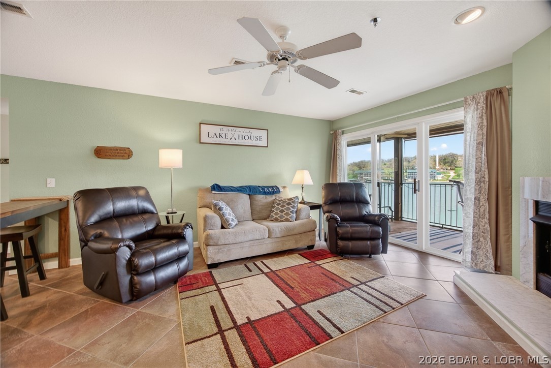 Well-maintained 3BR, 2BA end-unit condo offering added privacy and convenient access—just one flight of stairs from the parking lot. This unit has been carefully cared for and provides a comfortable, move-in-ready feel from the moment you walk in.

The covered deck is perfect for relaxing or entertaining while enjoying the water views without full exposure to the elements.

Includes a boat slip w/ hoist and remote and an additional PWC slip—an excellent setup for lake days and a major value add for both personal use and rental potential.

Located in a desirable complex close to town, this property offers a strong lineup of amenities, boat ramp, trailer parking, community pool, playground, and more.