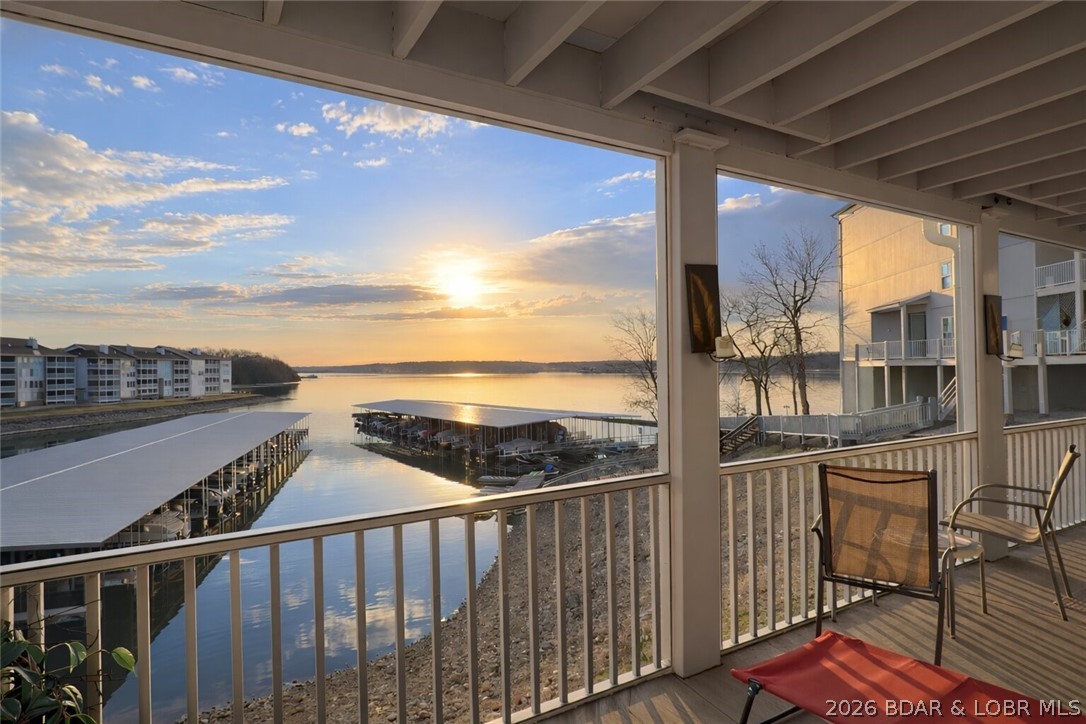 Condos like this one don’t come up very often at the iconic Regatta Bay Condominiums. This 2 bedroom, 2.5 bath unit offers prime lakefront views of the 12MM of Lake of the Ozarks. Take one flight of covered stairs down to reach Unit 1C and step inside to an open floor plan with water views throughout. The living room is the connecting piece between the kitchen and dining area and conveniently leads out to the screened-in lakeside deck. The deck can also be accessed from the primary suite, making it easy to step outside and enjoy the view. Both bedrooms are spacious and feature attached baths, providing privacy for guests. From the deck, you can even see the included boat slip and hoist, making lake days easy and accessible. Regatta Bay offers a variety of community amenities including pools, clubhouse, tennis courts, pickleball courts, playground, and more—making it a great place to enjoy everything Lake of the Ozarks has to offer.