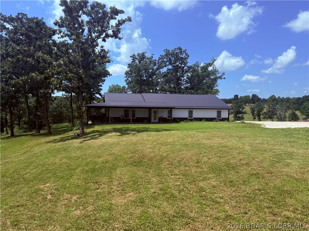 Priced below current appraisal and ready for new owners! Come view this custom home set on 5.2 acres ready to make your homestead dreams come to life. Inside you'll find an open concept living with four bedrooms, three full bathrooms, an office/bonus room, and an oversized two car garage. From the vaulted ceilings, custom kitchen with granite countertops and all whirlpool appliances, and generous bedrooms to the expansive covered front porch, not a detailed was missed. The 24*30 shop with water and electric on site offers extra room for toys, tools, and everything in between. The possibilities are endless and the views are even better!