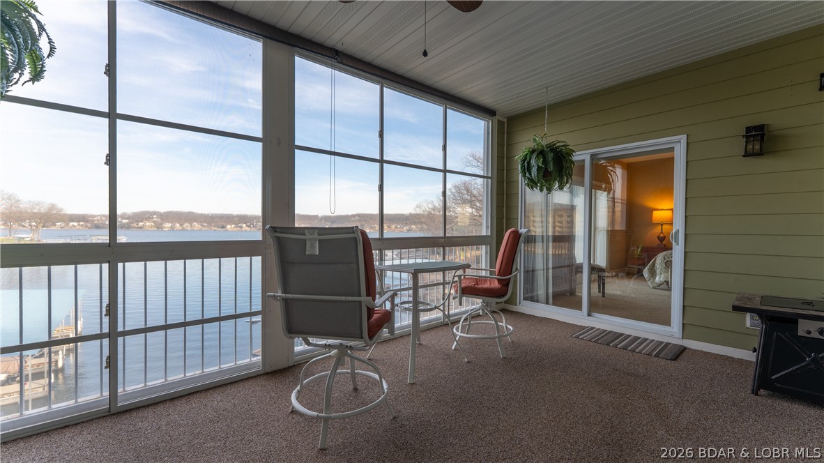 Enjoy panoramic lake views and outstanding value in this spacious 3-bedroom, 2.5-bath lakefront condo. Offering a functional floor plan with plenty of room to relax or entertain, this unit features a well-equipped kitchen, generous living spaces, and a primary suite complete with dual vanities, a walk-in shower, and a jetted tub. The screened deck with removable windows lets you enjoy the breathtaking views for three seasons, creating the perfect space to unwind. A 12x32 boat slip is included, with a garage and storage unit available for purchase to complete your lake package. The elevator-equipped, resort-style complex provides easy access to the waterfront and community amenities. Conveniently located near shopping, dining, golf, and popular lakefront attractions by both land and water, this condo is an excellent opportunity for a full-time residence, vacation getaway, or investment. Bring your personal touches and start enjoying the Lake lifestyle at an exceptional value!