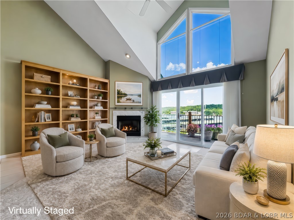 Welcome to this coveted top-level lakefront condo, offering over 1,600 sq ft of custom-designed over-sized living spaces and a much sought after GARAGE. This unit boasts 3 bedrooms and 3 baths, making it the perfect for a permanent resident or weekend retreat. Stepping inside, you will be greeted by an expansive, airy living room, filled with natural light and framed by views of the shimmering lake.  This home has a large kitchen, equipped with generous counter space, and ample cabinetry. Enjoy family meals in the adjoining dining area. You'll appreciate the convenient pantry and separate spacious laundry room. A highlight of this remarkable condo is the versatile loft area. This space can easily function as a 3rd bedroom complete with a private bath, with room for cozy sitting area and space for home office. The generous deck is equipped with a retractable awning - perfect for enjoying your morning coffee.  Nestled within an elevator building, you’ll enjoy easy access and peace of mind. Take advantage of the nearby top-quality golf courses, a variety of restaurants, and the Ha Ha Tonka State Park. This home has been lovingly cared for and is eagerly awaiting its next chapter.