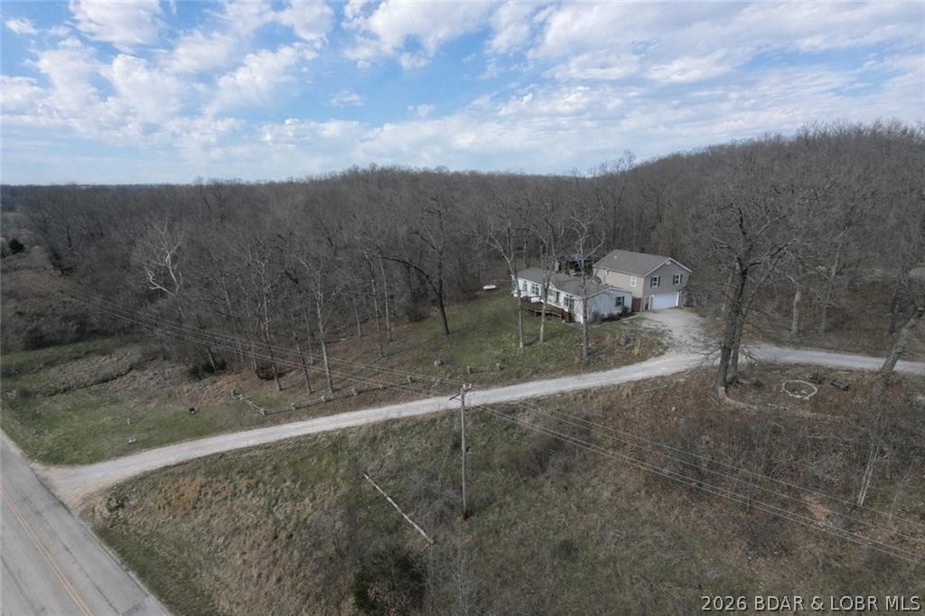 Spacious 5-bedroom, 3-bath home offering approximately 2,792 sq ft, built in 2005 and situated on about 3 acres in a quiet rural setting near Lincoln, MO. The property provides ample space both inside and out, with room for entertaining, storage, or future improvements. Ideal for buyers looking for privacy and land, this home offers strong potential with a little TLC. Selling as-is.