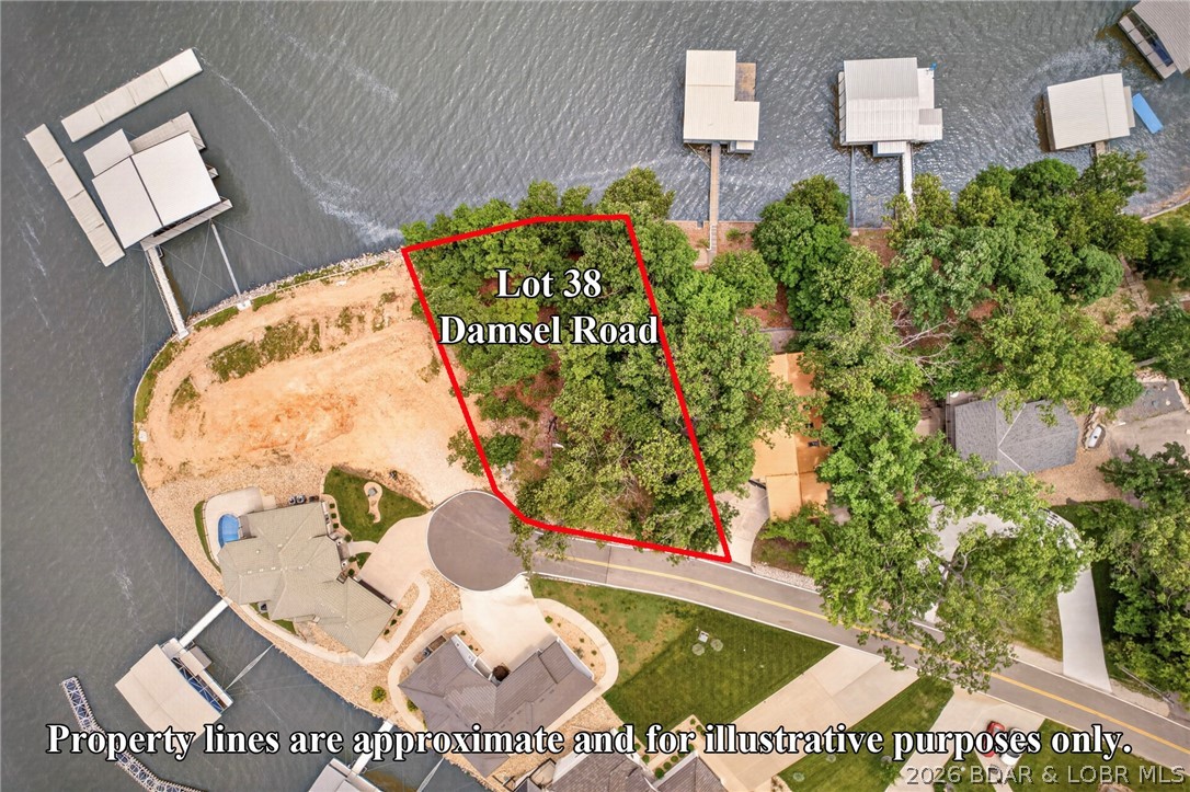 Build your dream lakefront retreat in one of the most sought-after areas at the Lake of the Ozarks. This exceptional waterfront lot offers 100 feet of shoreline on the 4.5-mile marker of the main lake, providing the perfect setting for enjoying breathtaking lake views, boating, and unforgettable sunsets. Located on exclusive Horseshoe Bend, this property combines privacy and convenience with no HOA restrictions and no subdivision assessments, giving you the freedom to create the lake home you've always envisioned without ongoing association fees. Centrally located by both land and water, you'll enjoy easy access to some of the lake's most popular waterfront restaurants, entertainment venues, championship golf courses, shopping, and recreational attractions. Whether you're looking for a full-time residence or a weekend getaway, this prime location places you in the heart of everything the Lake of the Ozarks has to offer. Rarely does an opportunity arise to own a premier main-channel lot in such a desirable location with the flexibility of no HOA and no assessments. Secure your piece of lakefront paradise and start planning your waterfront lifestyle today.