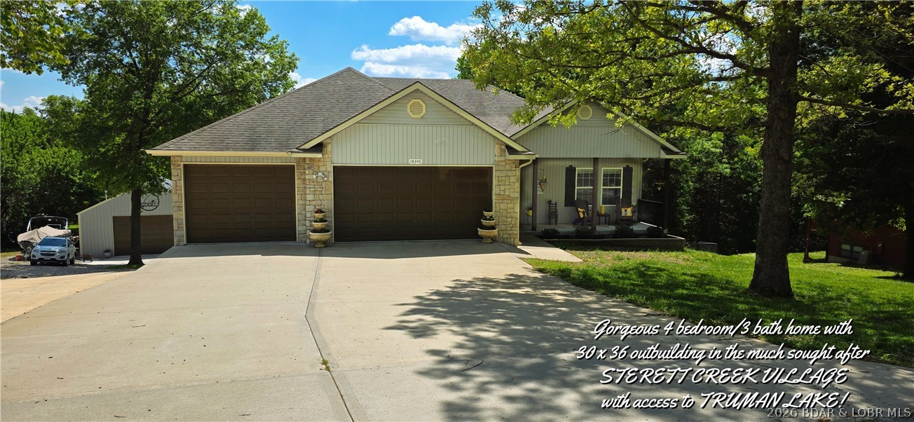YOUR DREAM HOME IS ON THE MARKET! Stunning 4 bdrm 3 bath home with large outbuilding in the beautiful TRUMAN LAKE community of STERETT CREEK VILLAGE. A wonderful concrete covered porch leads into an open floorplan with high ceilings, custom trim work, LVP floors & a lovely gas fireplace. The chef's kitchen with custom cabinets, quartz countertops, pantries & stainless appliances. The large main level master ensuite offers, double sinks, walk-in shower & closet. Main floor also features 2nd guest bedroom, full bath, laundry room and custom built-ins for coats & purses just off the kitchen. Main floor three car garage. Lower level walk-out boasts of cozy family room with wood burning stove, bar area & large windows. Two more nice size bedrooms with full bath & 2 storage rooms. Located just off the kitchen & living room is an expansive wrap around porch for entertaining after a long day on the lake. Concrete drive to a 30x36 heated outbuilding with concrete floors. In this vibrant community, amenities include pool, pickle ball & basketball courts. Just a stroll or a golf cart ride away to the marina. Located just minutes from the historic, award winning lake community of WARSAW, MO.