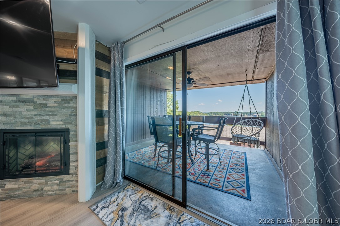 Welcome to your ideal Lake of the Ozarks retreat, where lifestyle meets investment. This beautifully furnished 2-bedroom, 2-bath condo is currently enrolled in a successful rental program and delivers strong rental performance, making it a smart income-producing property. Located just off KK Road at the 21-mile marker, you’ll enjoy quick access to the lake’s most popular restaurants, marinas, and entertainment- perfect for personal use and maximizing rental demand year-round. Set within the Knolls complex, residents and guests enjoy indoor and outdoor pools, tennis courts, parks, pavilions, and more- creating true resort-style living in every season. Inside, the open-concept layout has been remodeled with high-end finishes. The kitchen features quartz countertops, custom backsplash, stainless steel appliances, and modern lighting for stylish entertaining. Step outside to your oversized, covered private deck and take in sweeping lake views. Offered fully turn-key and ready to go, this condo is truly plug-and-play with strong rental history, prime location, and zero hassle. Whether you’re looking for a personal escape, a high-performing investment, or both, this checks every box.