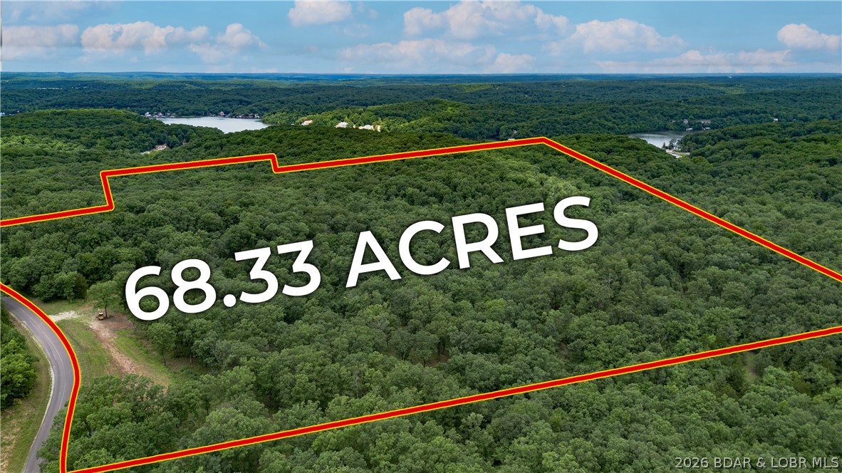 68 acres of opportunity in the heart of the Ozarks! Whether you're dreaming of building a private estate, developing a recreational retreat, creating a family compound, or simply owning a piece of land to escape it all, this unique property deserves a look. Consisting of three parcels with blacktop road frontage, the acreage offers a diverse landscape of gently rolling terrain, wooded hillsides, scenic valleys and multiple locations with potential for ponds or small lakes. Nature lovers will appreciate the abundant wildlife, established ATV/UTV trails and seasonal waterfalls that bring the property to life after a good rain. With no known restrictions, you'll have the freedom to build, hunt, ride, explore or develop to fit your vision. The varied topography provides privacy, character and endless possibilities that are hard to find in one tract. Conveniently located in Rocky Mount and just a short drive from Lake of the Ozarks, this is your chance to own a sizeable piece of Missouri ground at an affordable price. Whether you're investing for the future or looking for your own private Ozarks getaway, this property offers the space and flexibility to make it happen.