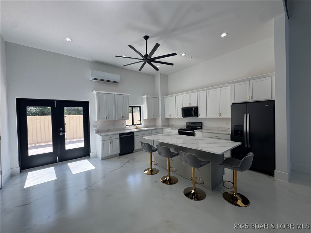 The Toy Box is located at the Lake of the Ozarks most recognized intersection at Horseshoe Bend and Bagnell Dam Blvd. in Lake Ozark, Missouri. With a 180 degree Panoramic View of Lake of the Ozarks, these Lux Loft units are like nothing else in the area. This unit is (25’ x 60’ with 23’ side walls and a mezzanine) for Residential use only. The development will be governed by a Condo Owner Association and offers  a pool, clubhouse with full indoor kitchen, innovative gym, pickle-ball court, basketball court, A boat wash area and RV pump out allow you to work and play within your own community. An observation deck overlooking miles of Lake of the Ozarks shoreline truly set this property apart from all others, while giving you the peace of mind of a gated community! All of this just a minute drive from the buzzing Bagnell Dam Strip. Come be a part of the Lake of the Ozarks where We Have a Lifestyle For You!