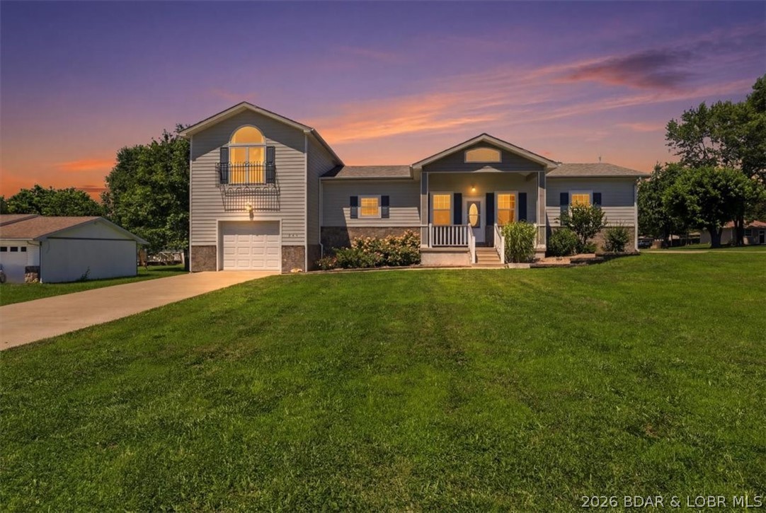 Beautiful 3-bedroom, 3-bath home built in 2018 offering modern style, quality finishes, and open floor plan. High ceilings, crown molding, and gorgeous wood flooring throughout the main level create a warm and inviting atmosphere from the moment you enter. The spacious kitchen is designed for both everyday living and entertaining, featuring abundant cabinetry, solid-surface countertops, appliances, and a large pantry. The living room has an electric fireplace, providing the perfect place to relax and gather with family and friends. The main-level primary suite offers a large walk-in closet and a private ensuite bathroom. A spacious laundry room and full bathroom are also conveniently located on the main level. Upstairs, you'll find two bedrooms and another full bathroom. Step outside and enjoy the large back deck, perfect for grilling or entertaining. The garage provides storage and workspace, while the desirable corner lot offers added curb appeal and outdoor space. This well-maintained home combines comfort, convenience, and modern finishes in a great location. Don't miss your opportunity to make this beautiful property your next home!