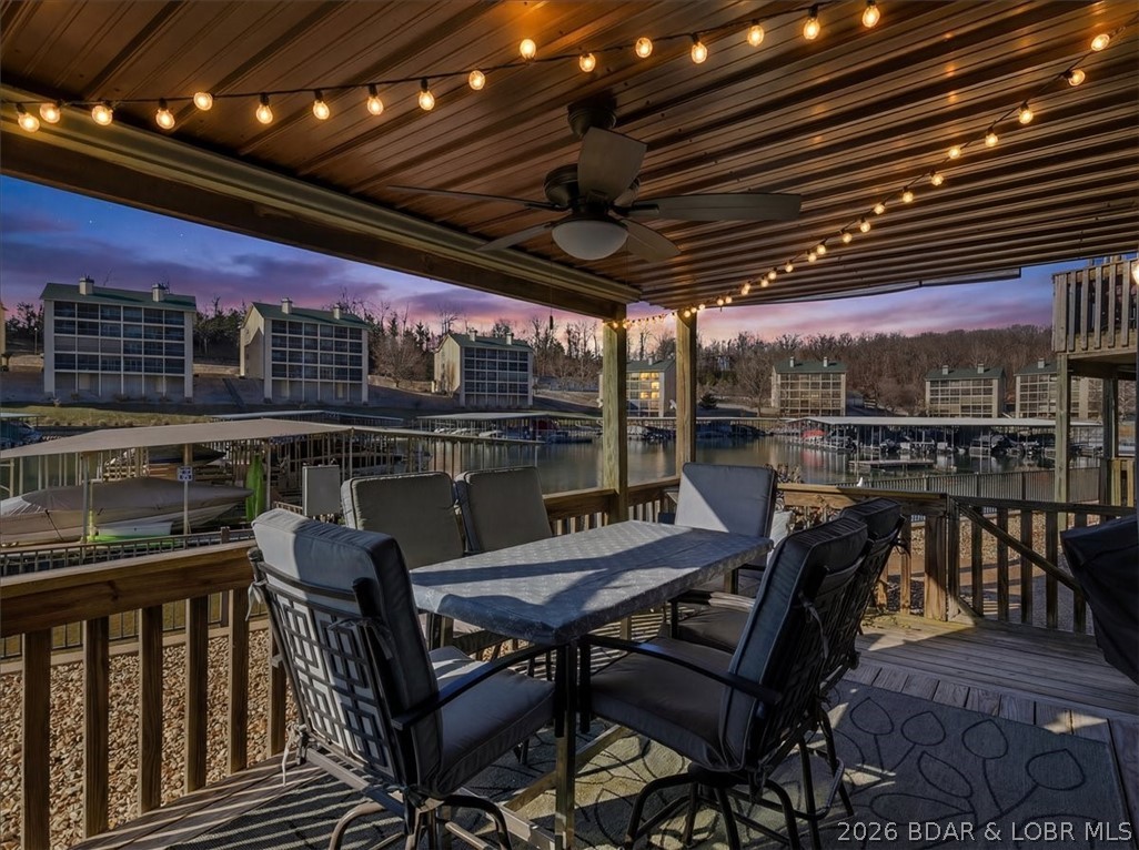Imagine waking up to coffee on your private deck as the lake sparkles below, then deciding—on a whim—to spend the afternoon on the water from your own boat slip. Now offered at a newly improved price, this turnkey 2BR/2BA lakefront condo at Southwood Shores Condominiums is your chance to step into effortless Lake of the Ozarks living. Inside, the open floor plan offers an easy flow for everyday living and entertaining, with a cozy fireplace for relaxing after a full day on the water. The spacious living area is perfect for gathering with family and friends or unwinding after sunset cruises. Step outside and enjoy peaceful sunrises and glowing sunsets over the water. Resort-style amenities include gated community, an indoor pool with hot tub, outdoor pool on the point with sweeping main channel views, tennis courts, playground, fish cleaning station, and trailer parking. A 10x24 boat slip with hoist is included, making lake days simple—walk out, hop in, and go. Close to shopping, golf, and lakefront dining, this home works as a getaway, retirement retreat, or investment with rental potential. More than a condo—it’s the lake lifestyle you’ve been waiting for.