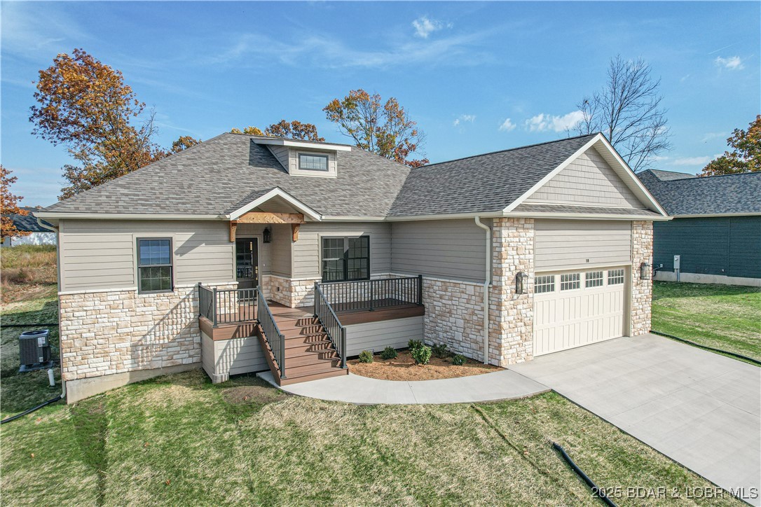 New Construction home at a great price point in Lakeside at Cross Creek! This quality-built home is located in one of the Lake’s most attractive subdivisions. The scenic drive in on a freshly repaved road sets the tone for this beautiful community, surrounded by stylish, well-maintained homes, and now the subdivision is even gated! Directly across from the sparkling community pool and tennis courts, this property offers unbeatable convenience for everyday enjoyment. This is not your typical spec home—the builder used premium materials and thoughtful details throughout. You’ll appreciate the upgraded flooring, custom cabinetry, quartz countertops, stainless appliances, fireplace & tiled showers.  Black windows, gold hardware, elegant paint colors and stylish fixtures give the home a warm, upscale feel. The smart layout provides one-level living with a 2-car attached garage and a very minimal stairs. This allows for a fantastic covered walk-out patio overlooking a great backyard—ideal for relaxing and entertaining. Whether you’re seeking a full-time residence or a low-maintenance lake retreat, this modern home delivers style, comfort, & craftsmanship in a prime location.