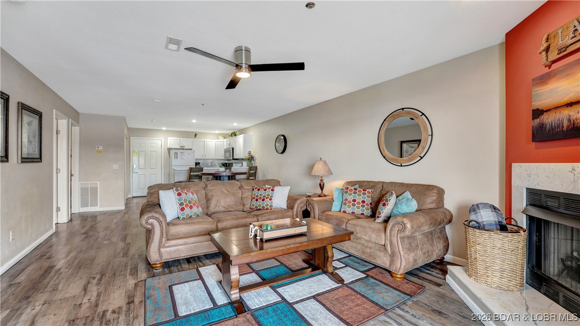 You won't want to miss this well taken care of 2 bed, 2 bath condo sitting at the 21mm in Osage Beach! This unit has new flooring, comes Turn-key, and includes a 12x30 ft. boat slip. Located in the heart of Osage Beach this condo is centrally located close to all the lakes largest attractions by both land and water. The open concept kitchen, dining, and living room allows for space for all your guests. The view from the deck offers a 180-degree view of the main channel! The master bedroom offers its own private on-suite, walk in close, and views overlooking the main channel. One additional bedroom and one additional bath give your guest the privacy they deserve. Looking for the perfect investment? This condo already has nights on the books for 2026 and has done very well in the past! The Ledges complex is very family-oriented offering two pools, a playground set, and sand beach! Be sure to schedule your showing soon as this one won't last!
