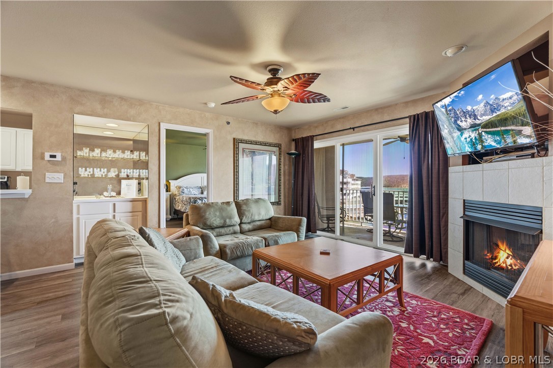 Wake up to breathtaking lake views and end your day with one of the best seats on the lake for the Lake Shootout. Located in the heart of Osage Beach, this fully furnished 2-bedroom, 2-bath condo offers the perfect blend of lake living, convenience, and investment potential. Overlooking the beautiful Lake of the Ozarks State Park, you'll enjoy peaceful views year-round with unbeatable front-row views during Shootout weekend. Inside, the turn-key interior features stylish furnishings and an open floor plan that's perfect for relaxing or entertaining. Nightly rentals are allowed, making it an excellent personal getaway or income-producing property. The HVAC was replaced just 2 years ago for added peace of mind. A 12x30 boat slip with lift is included, providing quick access to some of the best boating on the lake. Whether you're searching for a weekend escape, full-time lake home, or investment property, this condo is ready for you to start enjoying Lake of the Ozarks from day one.