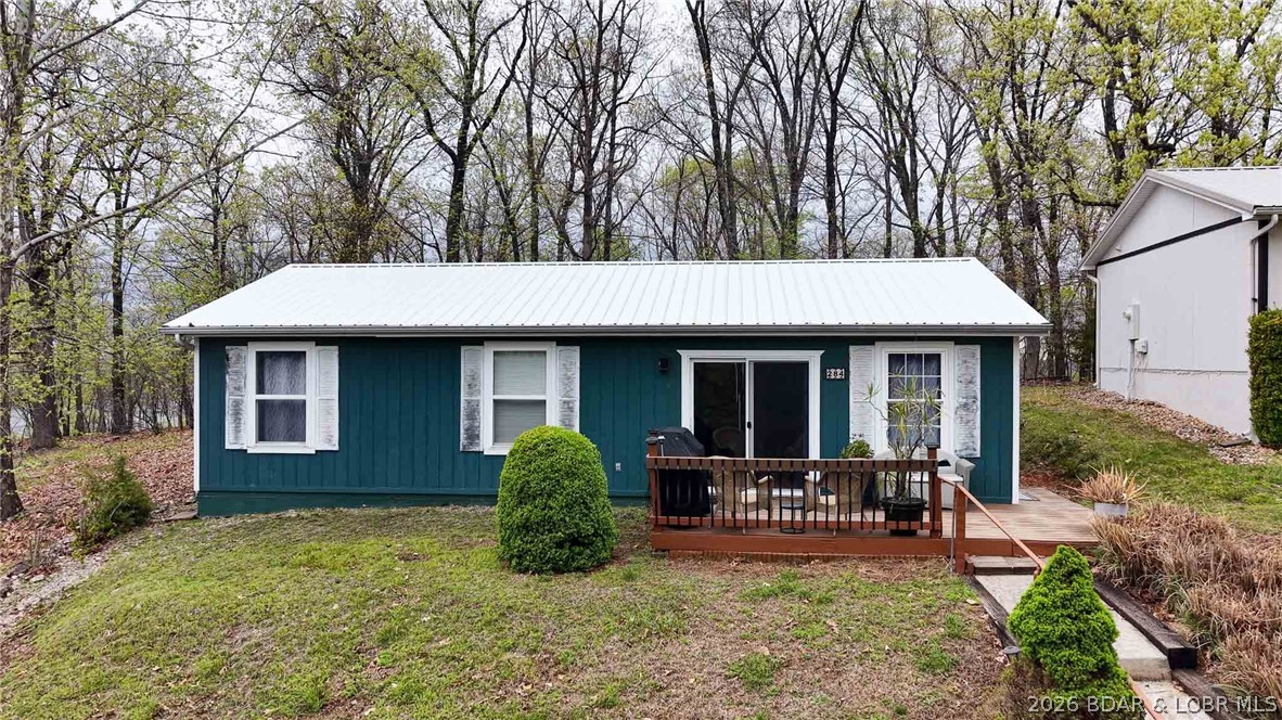 Here's your opportunity, and it's a good one!! 284 Storm Cove sits on an oversized lot with an additional adjacent parcel included, giving you the kind of space, privacy, and long-term flexibility that homes at this price point rarely come with. A newer metal roof, fresh paved driveway, updated flooring, blown insulation, gutter guards, refreshed bathrooms, newer appliances, and years of steady, thoughtful improvements add up to something buyers can feel the moment they walk through the door. This isn't a flip. This is a home that's been lived in and looked after, and it shows. The location alone makes this worth a serious look. Storm Cove is a highly sought-after address, and this property puts you right in the middle of everything the Lake of the Ozarks area has to offer. Whether you're a family ready to plant roots in a home that's truly move-in ready, or a buyer looking for a smart, low-maintenance long-term rental investment, the pieces are already in place. The work is done, the lot is generous, and the value is real. Properties like this — well-kept, updated, and priced right — don't stay available long in this market. Come take a look before someone else does.