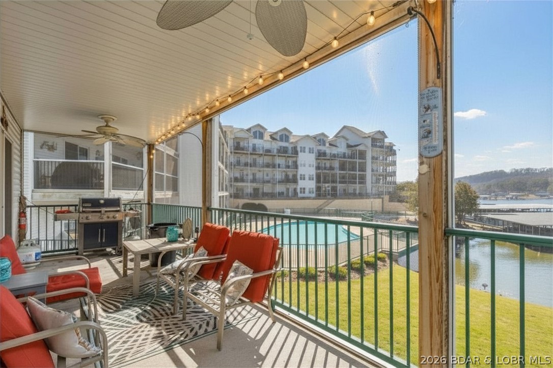Enjoy easy lake living in this well-maintained 3-bedroom, 2-bath waterfront condo. This end unit is easily accessible from the parking lot and has an inviting covered walkway. The open-concept floor plan seamlessly connects the kitchen, dining area, and living room, creating an ideal space for everyday living and entertaining.  The primary suite features a private bathroom, while two additional bedrooms provide plenty of space for family and guests. The private screened balcony provides the perfect setting for entertaining guests or simply enjoying the beautiful surroundings. Located in the gated Cedar Heights community, you can enjoy access to multiple swimming pools, including one lakefront pool, beautifully maintained grounds, and a 10x24 boat slip, making it easy to get out on the lake whenever you want. Whether you're looking for a full-time home, weekend retreat, or investment property, this condo offers a great opportunity to enjoy everything Lake of the Ozarks has to offer.