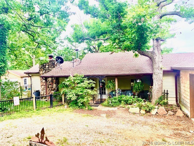 Welcome to your dream lake home, where comfort, and waterfront fun come together. This beautifully updated property features plenty of parking for family and friends. Inside, you’ll love the newly remodeled kitchen (2024) complete with a spacious walk-in pantry, perfect for storage and entertaining. Elegant bamboo flooring flows throughout much of the home, adding warmth and character. Relax year-round in the screened-in lakeside porch, where you can enjoy stunning water views without the bugs. The primary suite offers a cozy fireplace and a peaceful retreat after a day on the water. A southern exposure fills the home with natural light, while the versatile back bedroom provides an excellent option for a mother-in-law suite, guest quarters, or private living space. Outside, you’ll be captivated by the beautifully landscaped grounds leading to a gorgeous private dock, ready for all your boating, fishing, swimming, and lakeside living adventures. Whether you’re looking for a full-time residence, a weekend getaway, or the perfect place to entertain, lakefront property delivers the lifestyle you’ve been dreaming of. Professional photos coming soon.