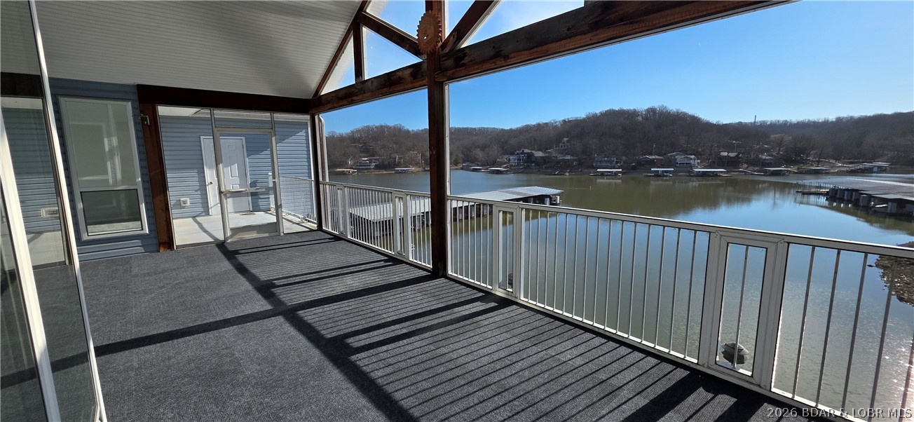 If You are looking for a move in READY unit, then this one is for you. Complete update in 2026 from all new paint, new flooring, new appliances, new HVAC 2025. 3 master bedrooms, open concept living room, dining, kitchen area. Large windows that bring in natural sunlight and great view. Awesome screen porch for entertaining and enjoy the summer weather. Included is a boat slip, boat hoist and a one car garage. Located at the 1 Mile Marker of the Big Niangua that is close to places like Fish and Company, Larry's on the Water and the Cave. There are lots of amenities with the Shores of Camelot for your enjoyment. Located on the top floor and end unit.