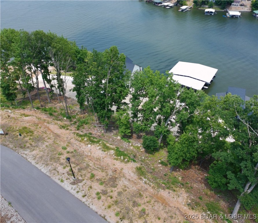 Lots are now ready for you to build your dream home at one of the Ozarks hottest new subdivisions, The
Waters. The Waters is located at Horseshoe bend on the 3 MM of the lake. There are 27 different lot locations
and each have their own unique layout and characteristics. Second tier lots will have the ability to buy boat
and/or jetski slips in the brand new community dock going in on lot 8 as well. Take your once in a lifetime
opportunity to build your dream home at The Waters today!