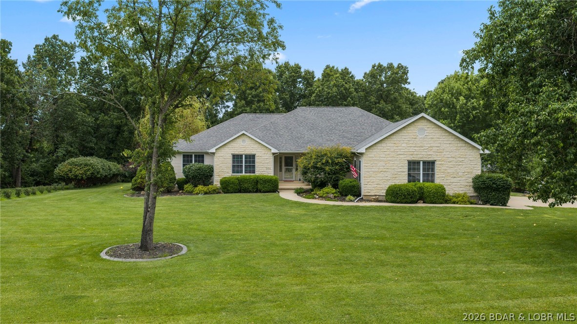 Are YOU looking for a beautiful large home on 3 acres that is not in an HOA? Are YOU looking for a home that has a private pool and a 1,998 sq ft detached 4+ car garage/workshop with RV hook up and adorable guest apartment? If so, YOU have found your dream home! This 5 bdr, 4.5 bth home offers over 5,000 sq ft.  The main level features two master suites, perfect for multi-generational living or guest privacy. Enjoy the bright & open kitchen/dining area with a gas stove, and large kitchen island. This flows right into the screened in porch overlooking the private heated in-ground pool, hot tub, and beautiful landscaping. The lower level is designed for entertaining with a large family room, full bar, game area or workout space, plus two additional non-conforming bedrooms. The guest apartment is attached to the RV garage/workshop and is set up like a 1 bdr apartment with full bath & kitchen. Conveniently located close to schools, grocery stores, the hospital, and Lake area attractions, yet offering peaceful privacy. This property truly combines space, luxury, and functionality in an unbeatable location. Call for a private showing today!