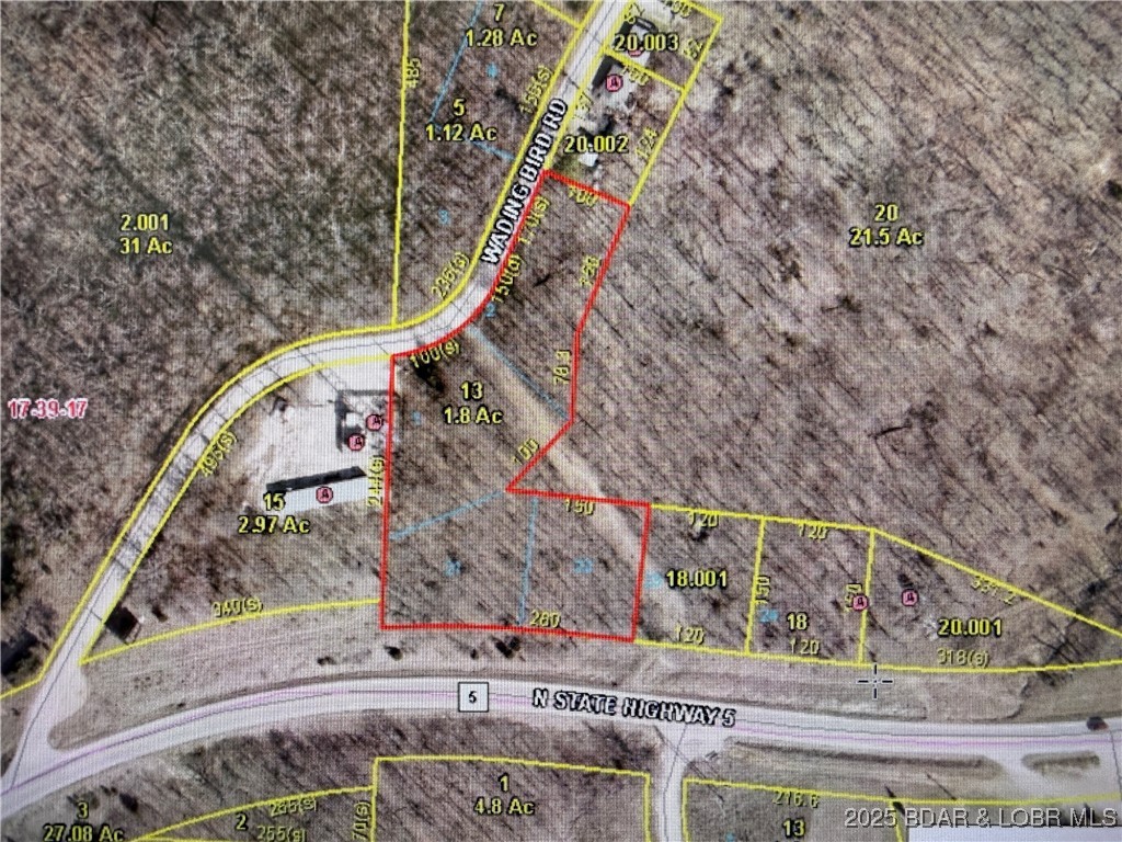Osage View 1.8-acre parcel, room for a large garage to keep your RV and toys in close to town.  No trailers Allowed